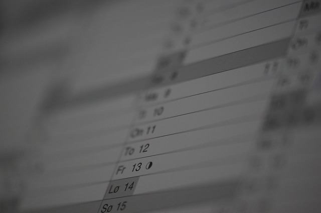 Calendar with highlighted dates and a contract document
